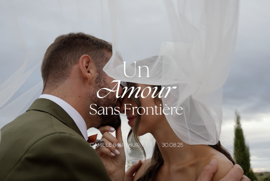 Jeune couple proche sous un voile de mariés sous un ciel nuageux